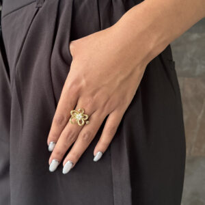 ANILLO FLOR HUECA CON ZIRCONIAS